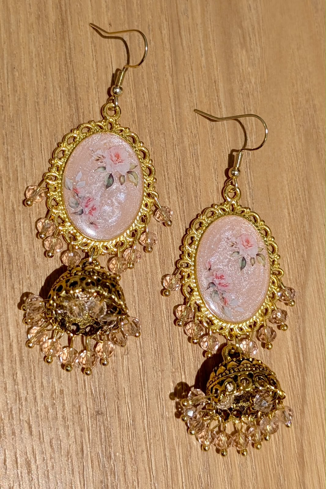 Peachy Pink Shimmery Jhumkay in Gold