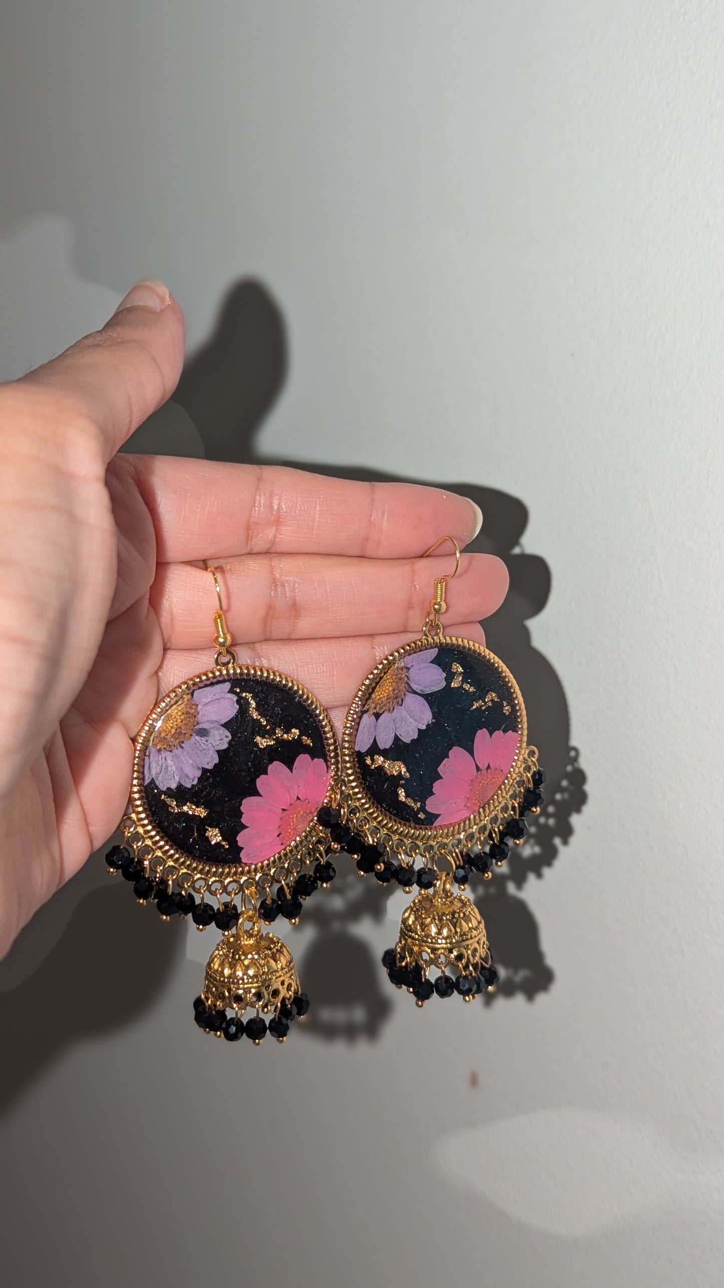 Dreamy Floral Black Jhumkas in Gold