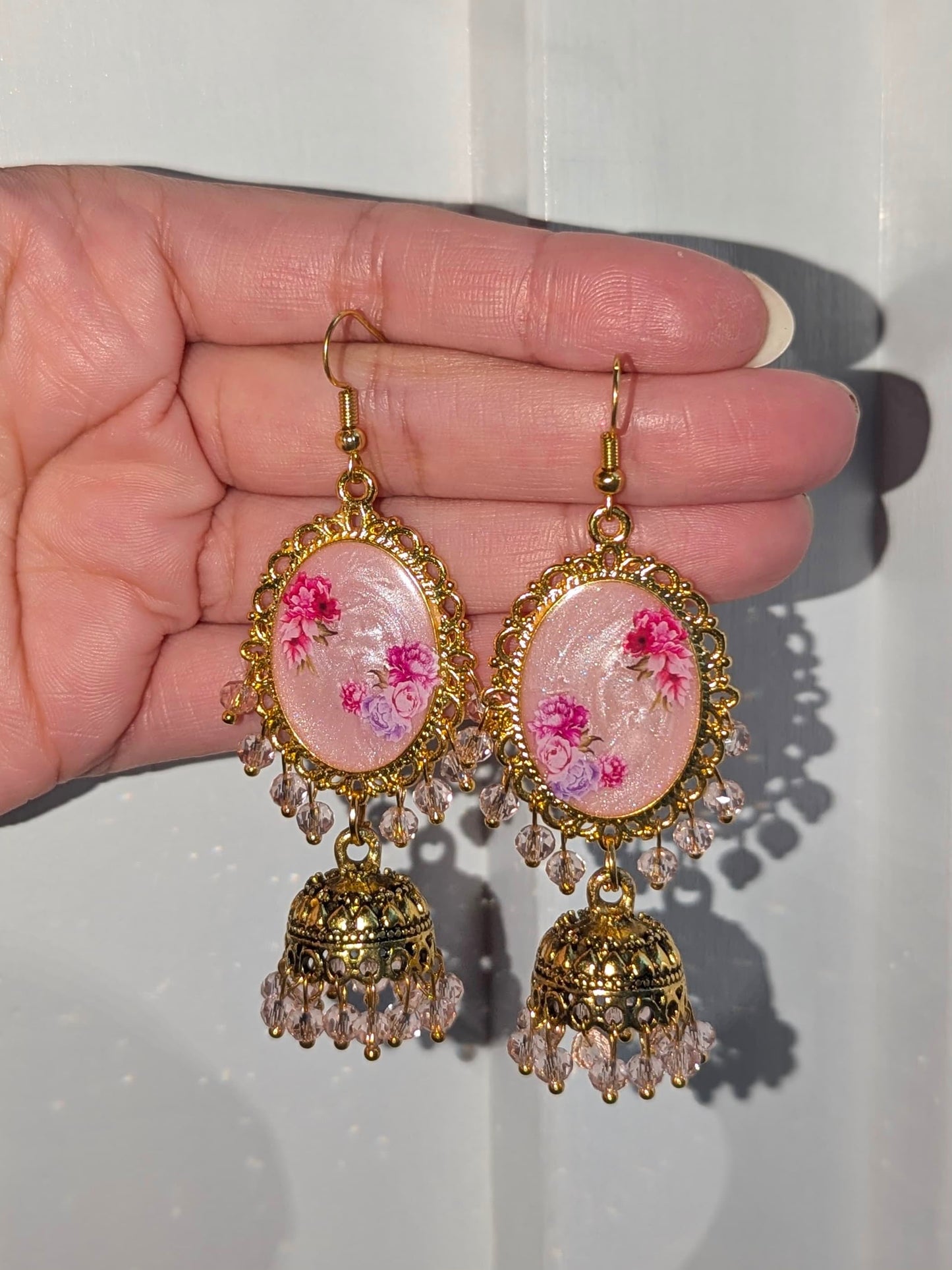 Multi Pink Shimmery Jhumkay in Gold