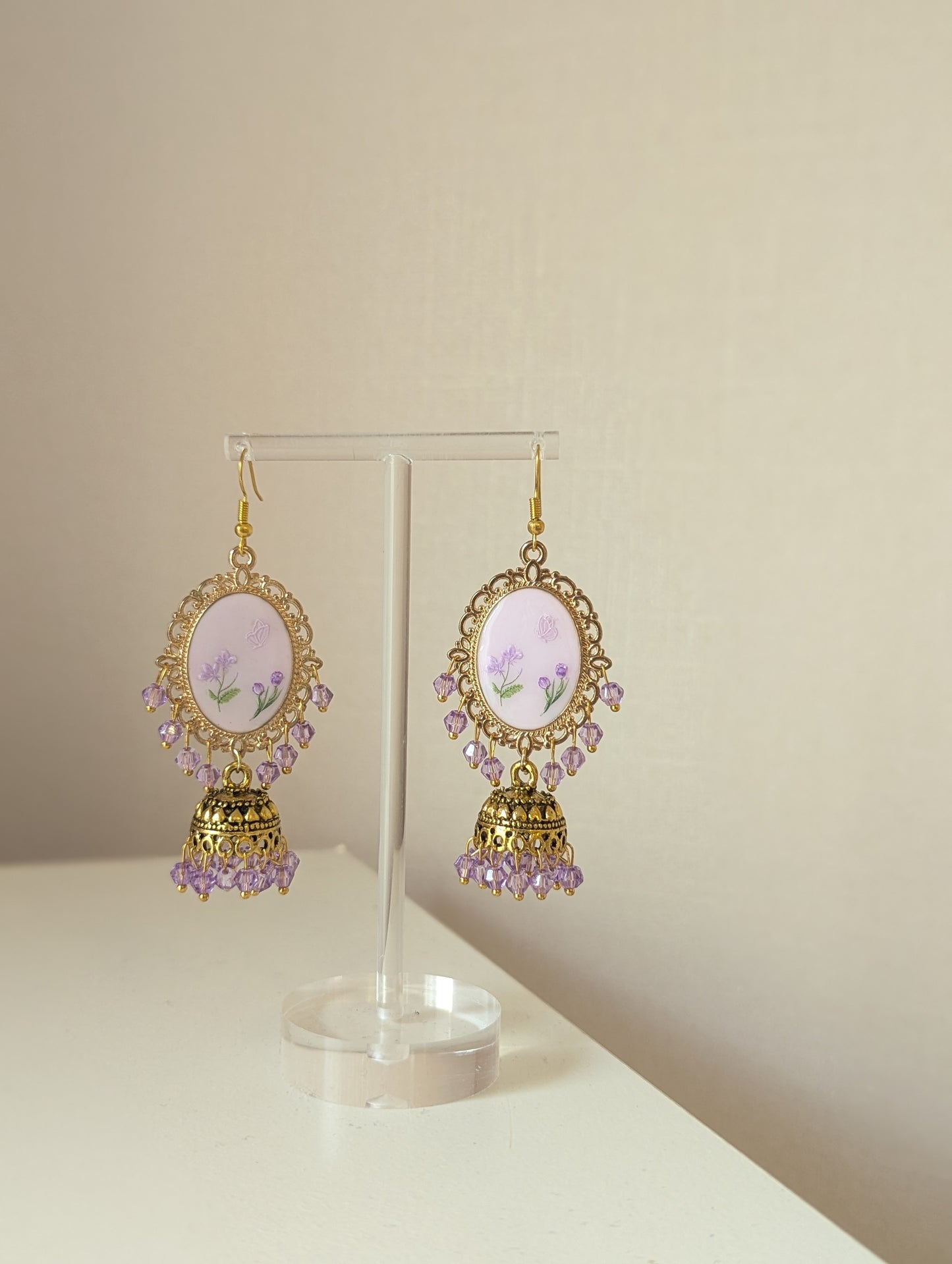 Purple on purple floral jhumkay drop earrings in gold