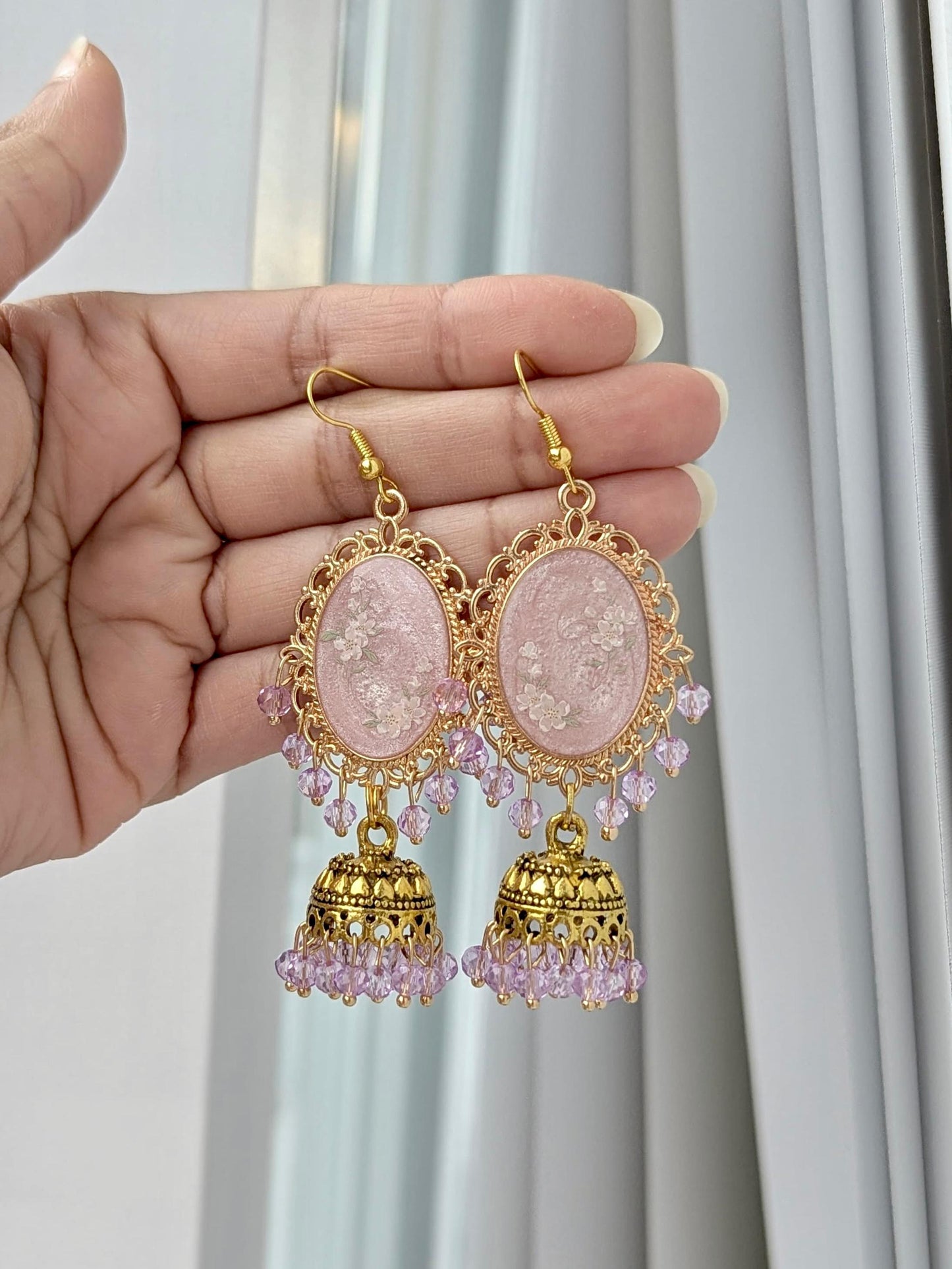 Pink and Lilac Dreamy Jhumkas in Gold