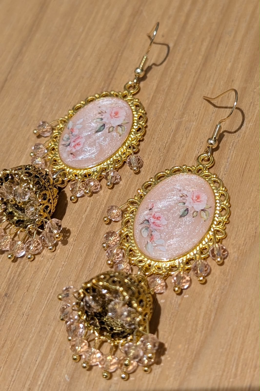 Peachy Pink Shimmery Jhumkay in Gold