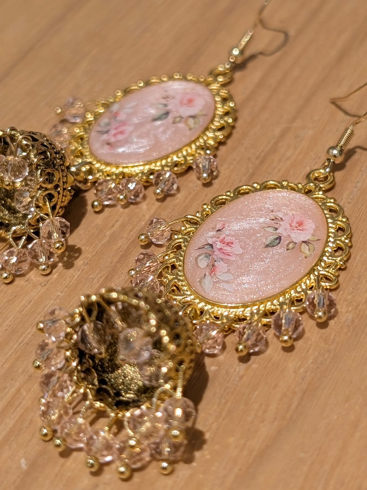 Peachy Pink Shimmery Jhumkay in Gold