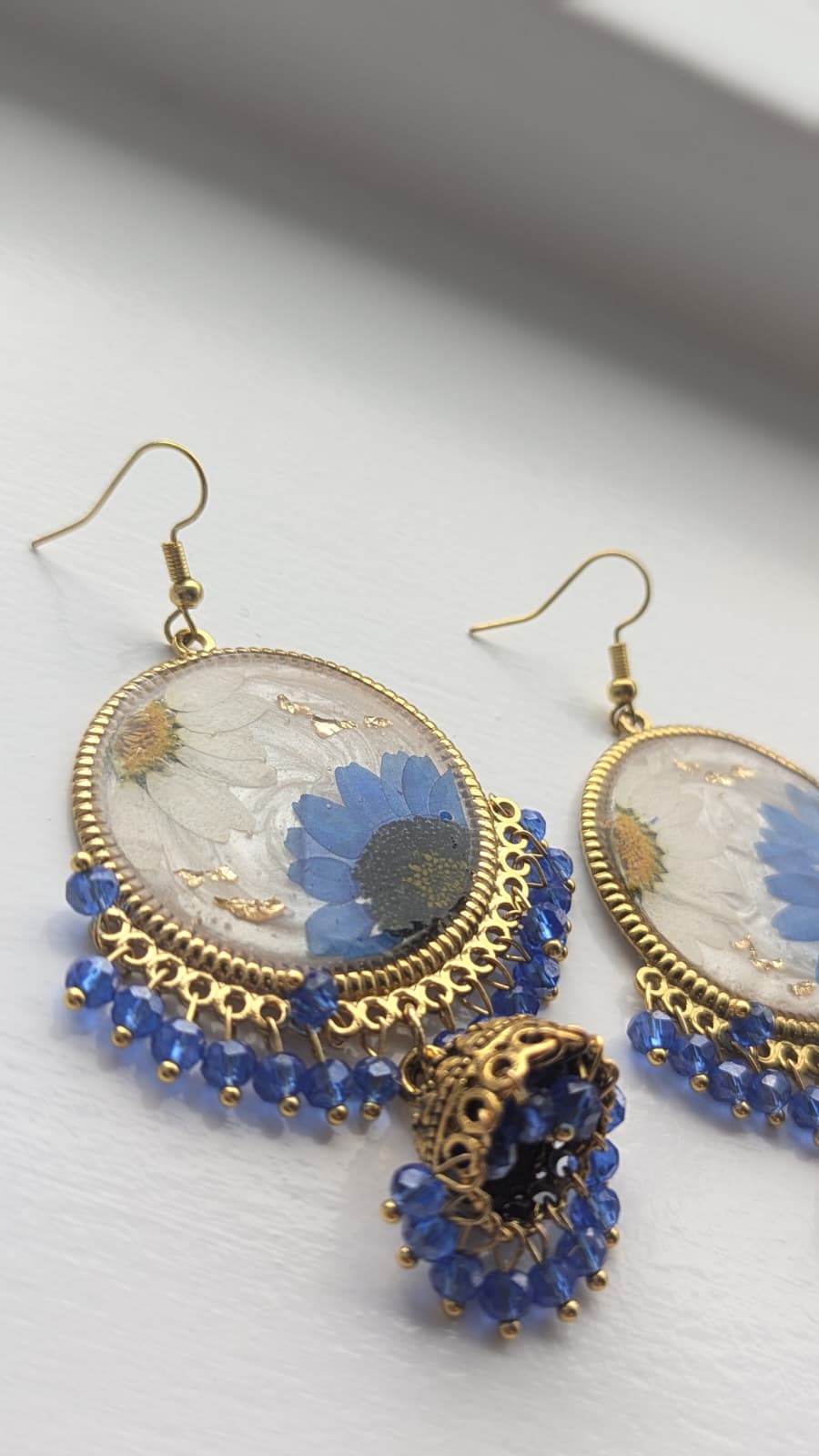 Dreamy Floral White Jhumkas in Gold