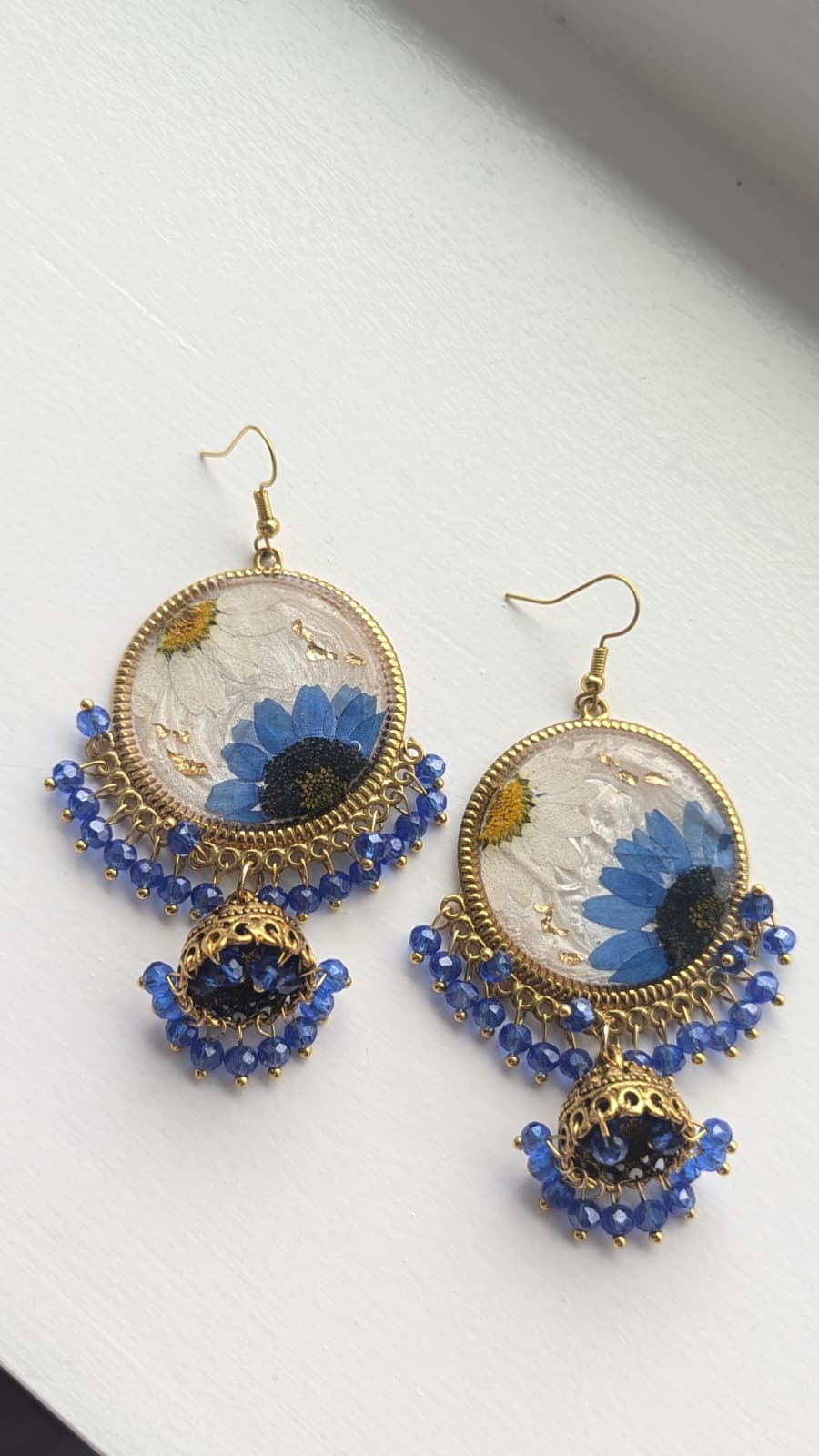 Dreamy Floral White Jhumkas in Gold