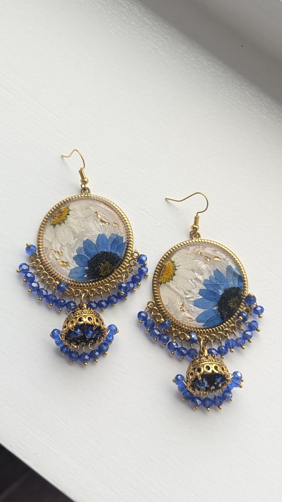 Dreamy Floral White Jhumkas in Gold