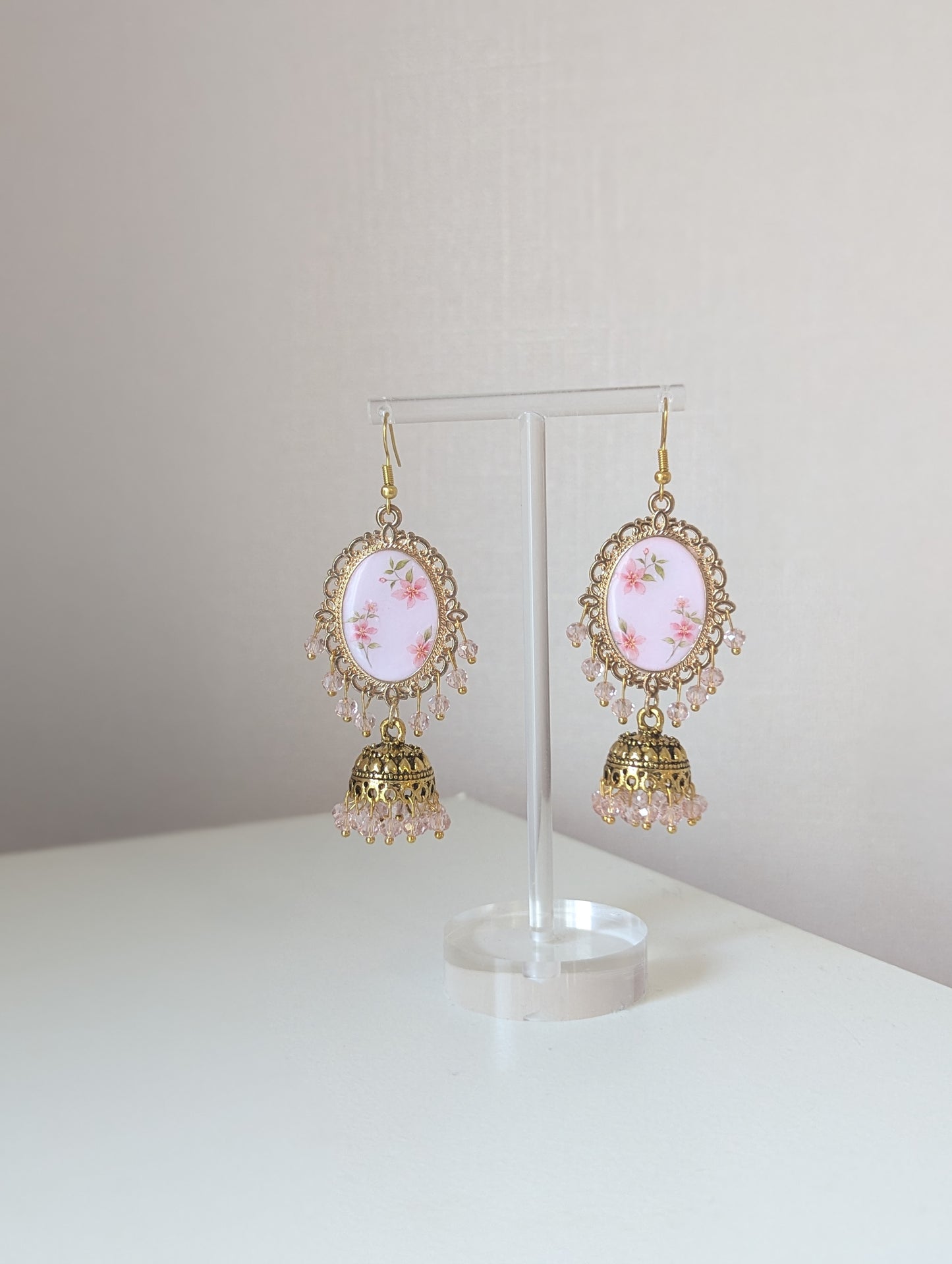 Pink floral jhumka drop earrings in gold