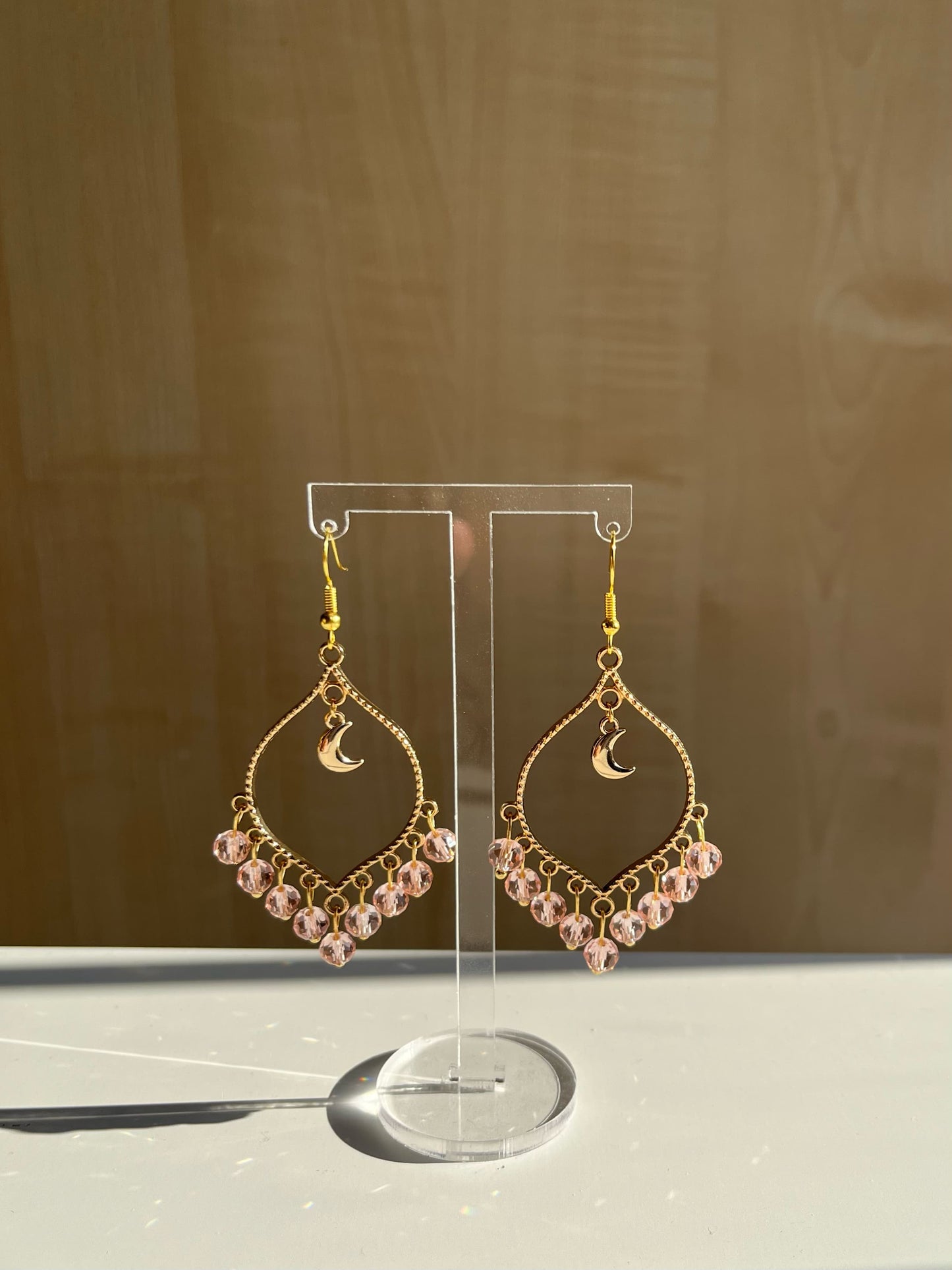 Pink crystal moonlight earrings in gold