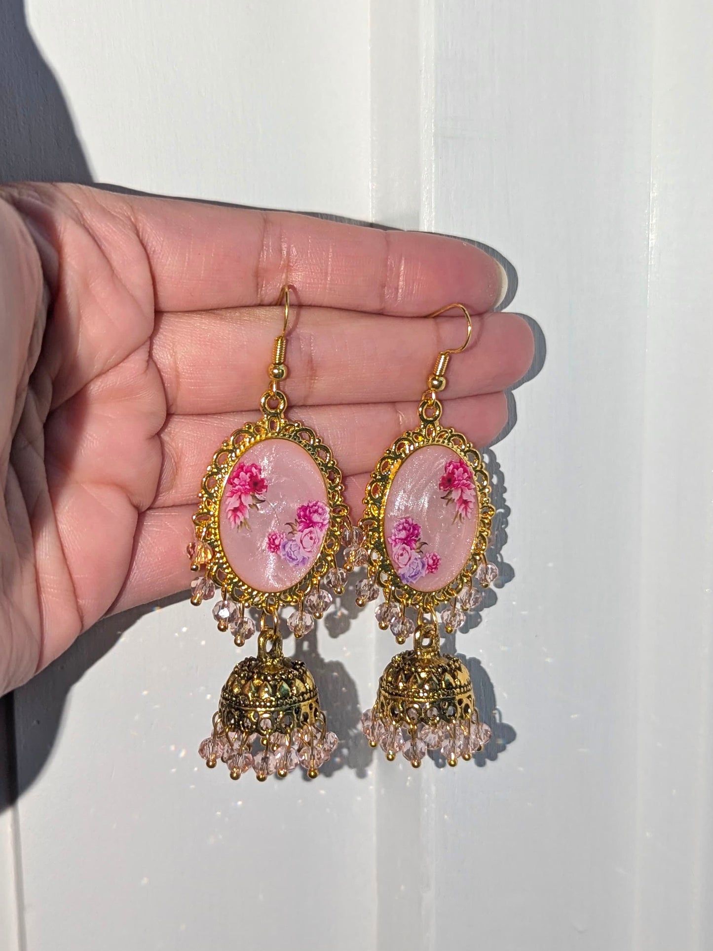 Multi Pink Shimmery Jhumkay in Gold