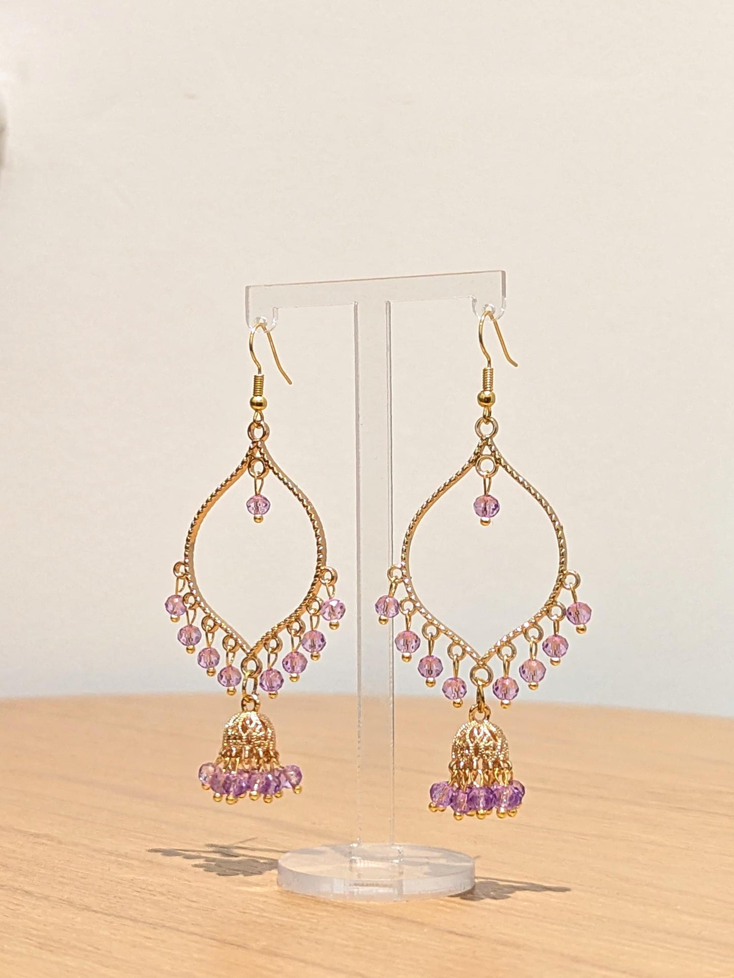 Jhumka drop earrings in gold and purple