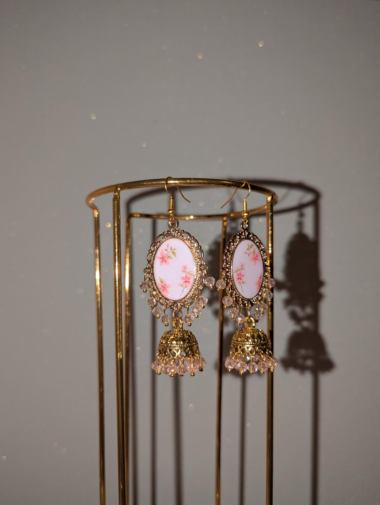 Pink floral jhumka drop earrings in gold
