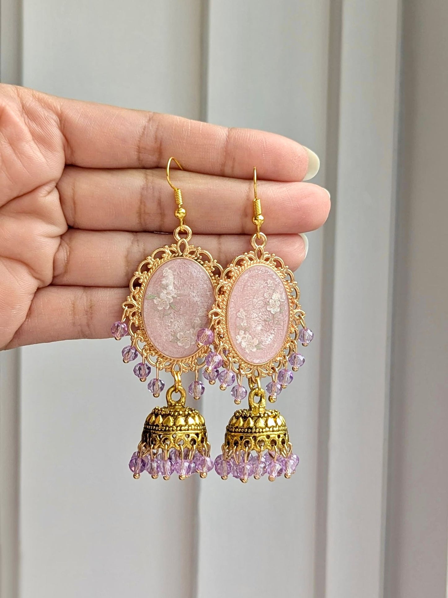 Pink and Lilac Dreamy Jhumkas in Gold