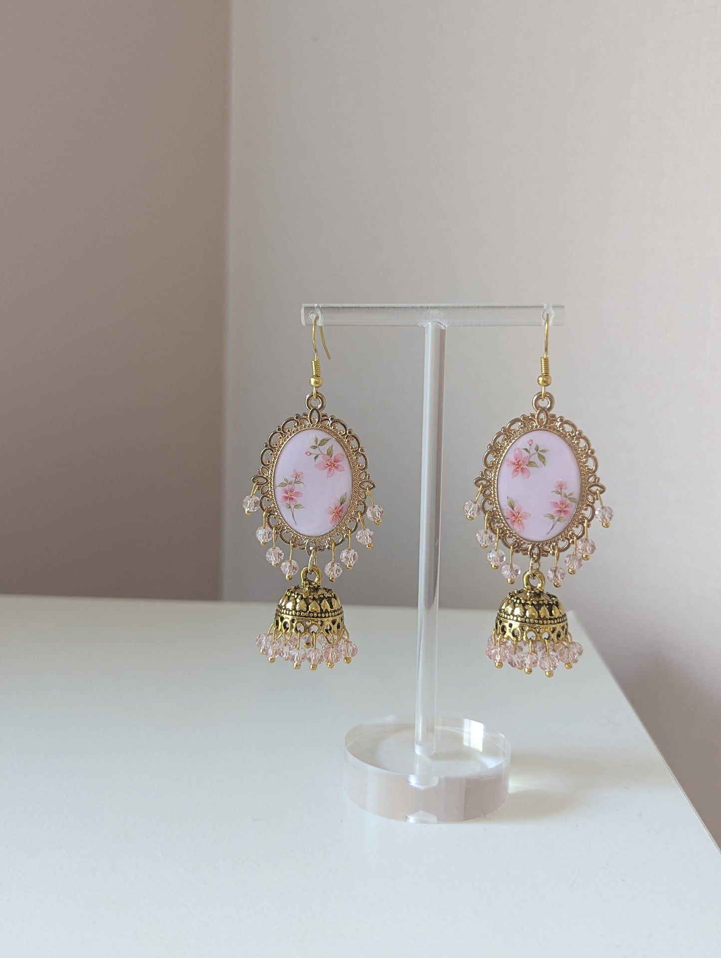 Pink floral jhumka drop earrings in gold