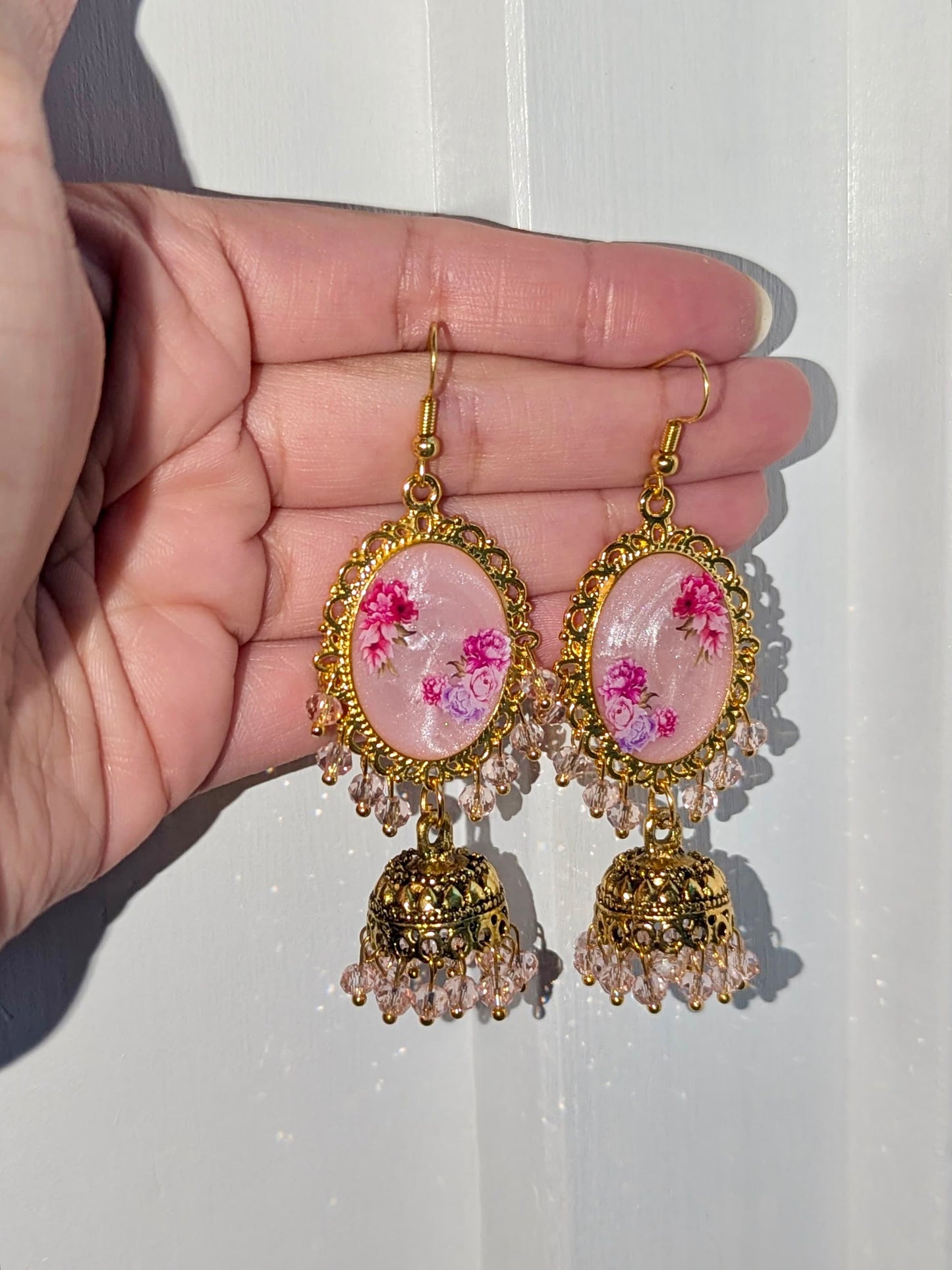 Multi Pink Shimmery Jhumkay in Gold