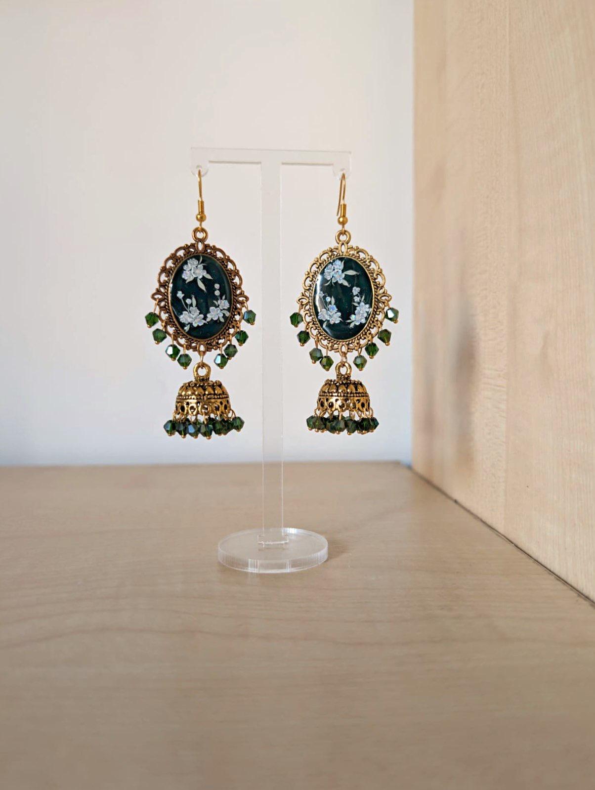 Green floral resin jhumka earrings