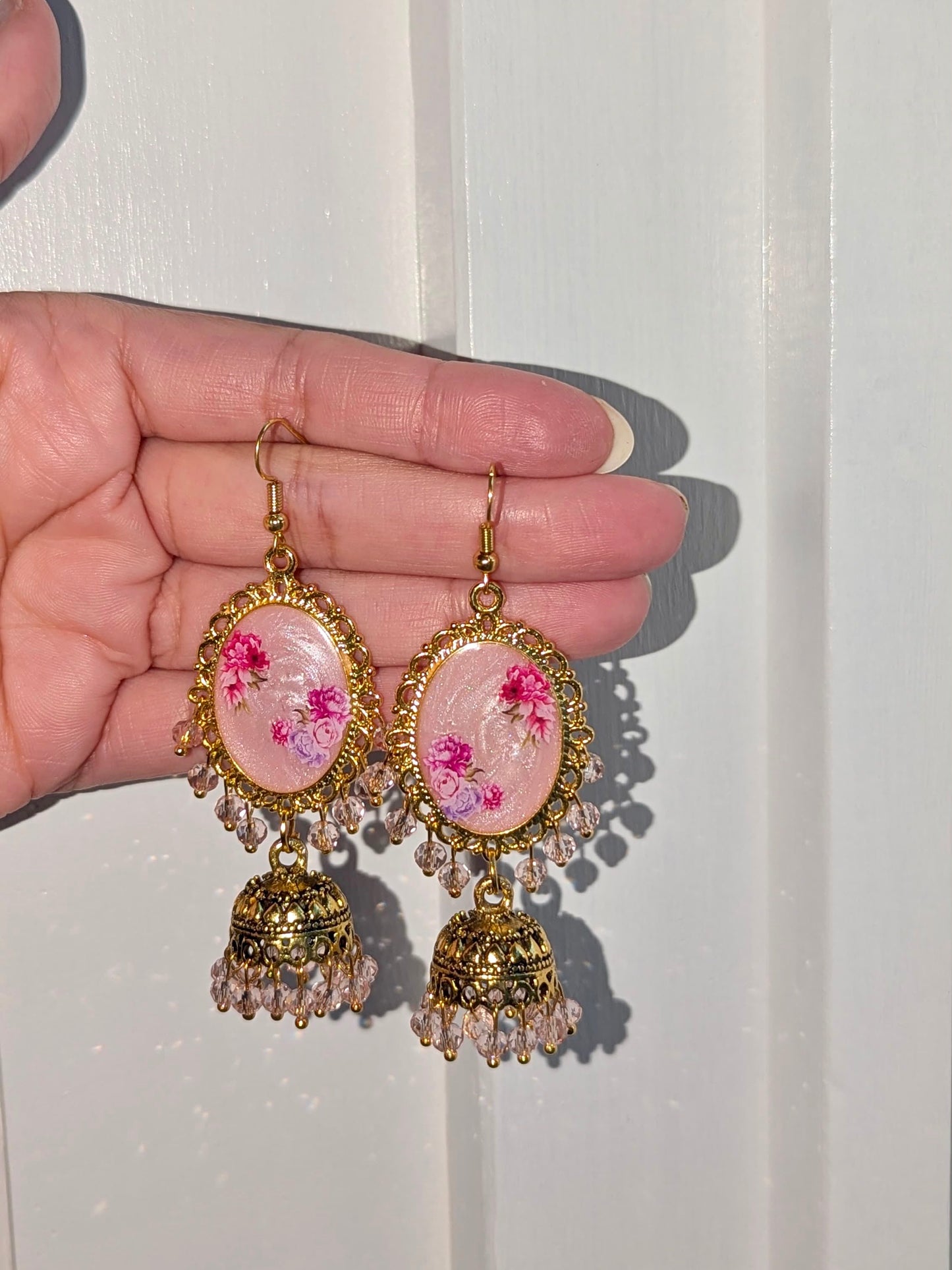 Multi Pink Shimmery Jhumkay in Gold