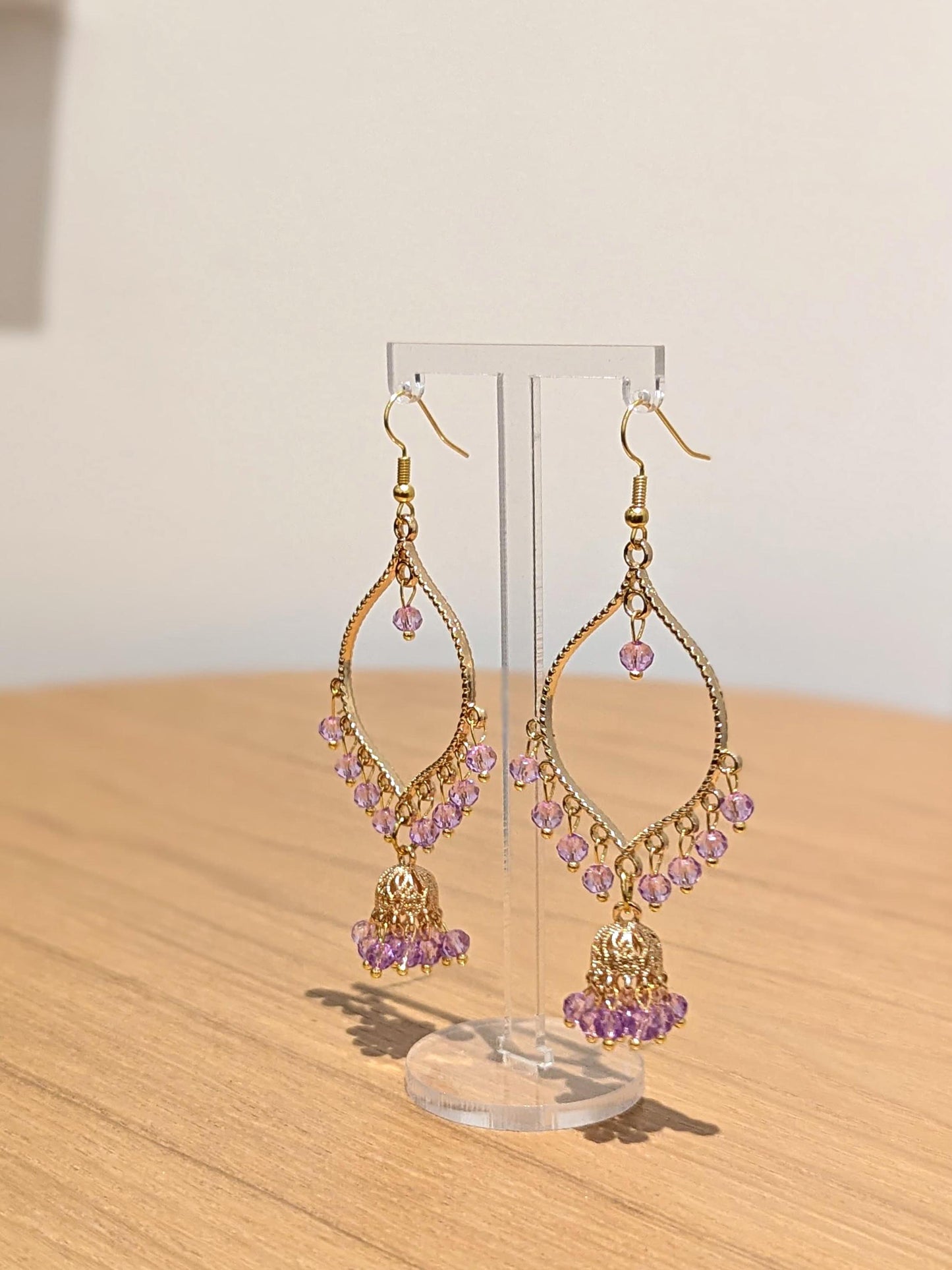 Jhumka drop earrings in gold and purple