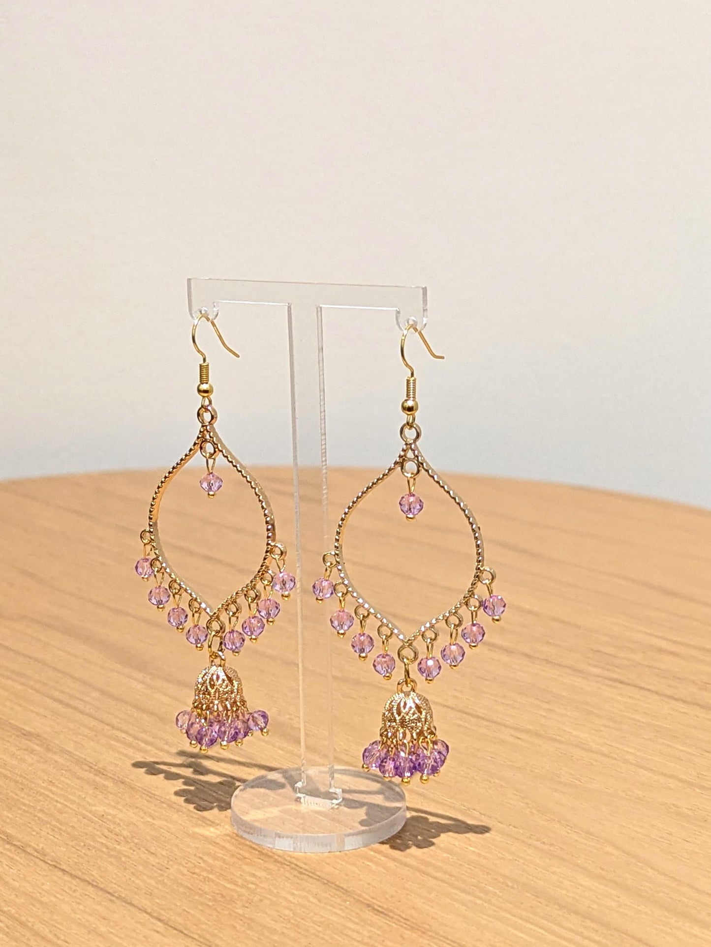 Jhumka drop earrings in gold and purple