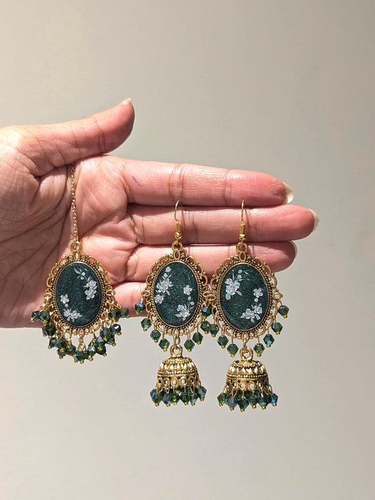 Green jhumka tikka set in gold bronze