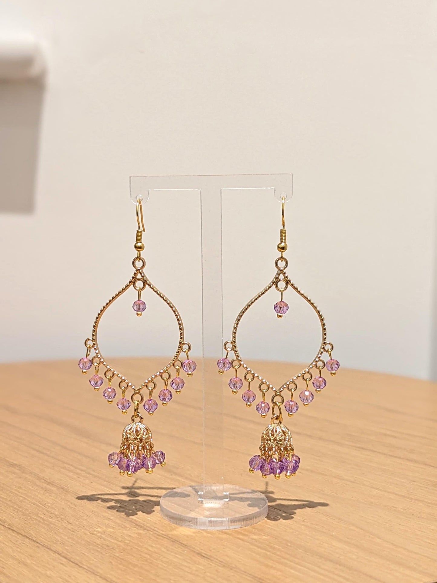 Jhumka drop earrings in gold and purple
