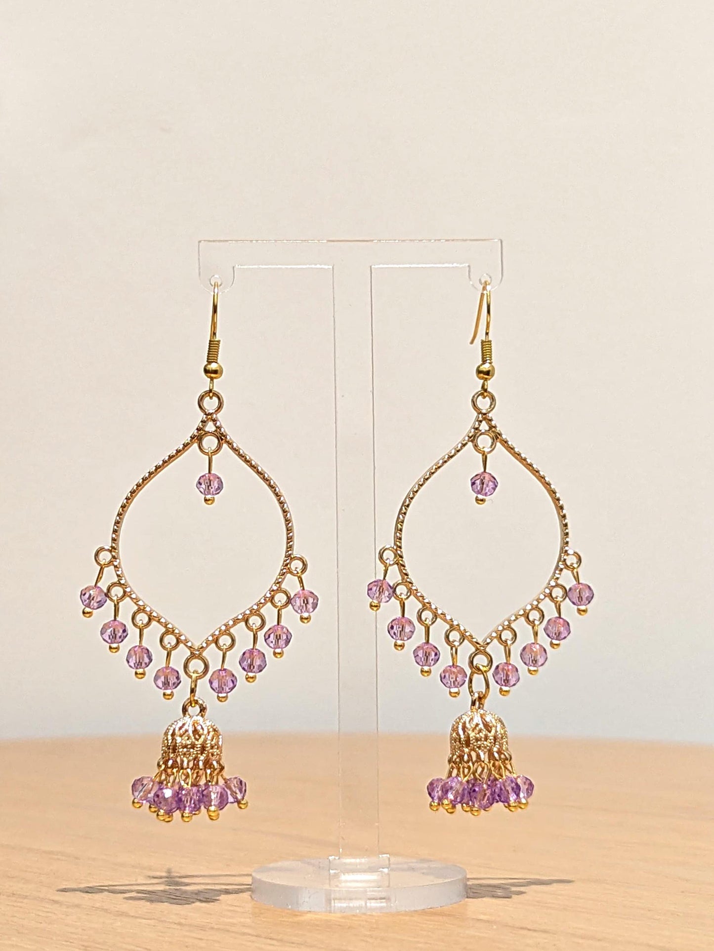 Jhumka drop earrings in gold and purple