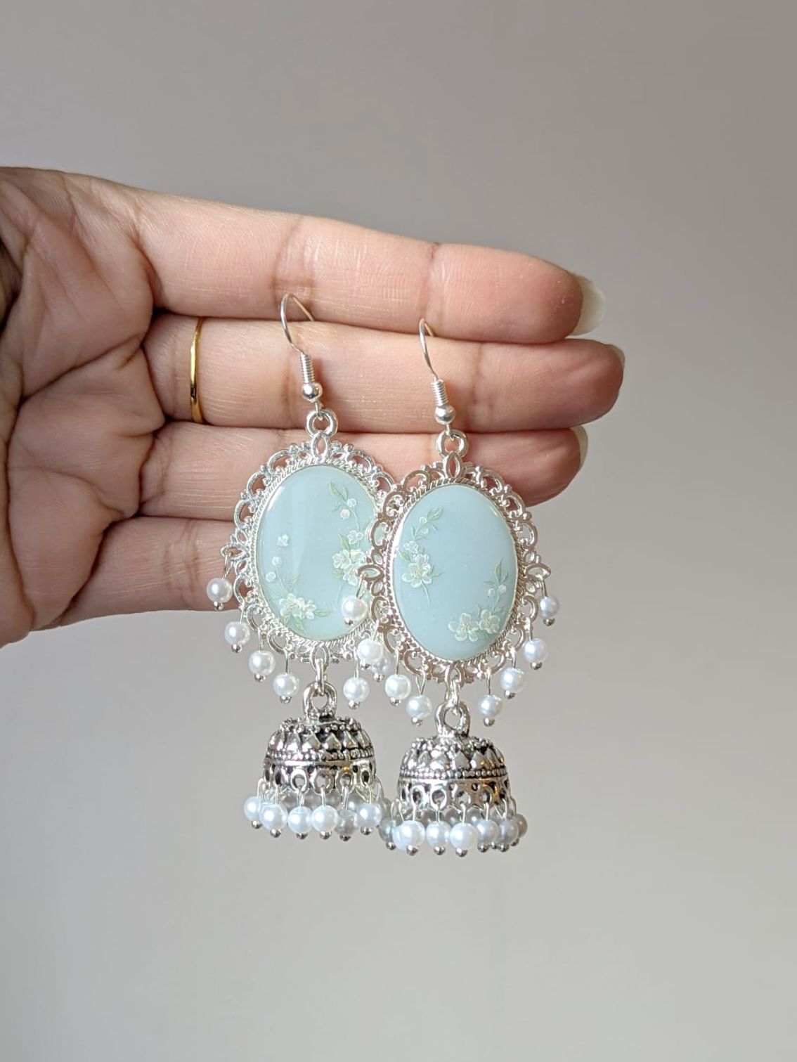 Light Blue White Floral Jhumkas in Silver