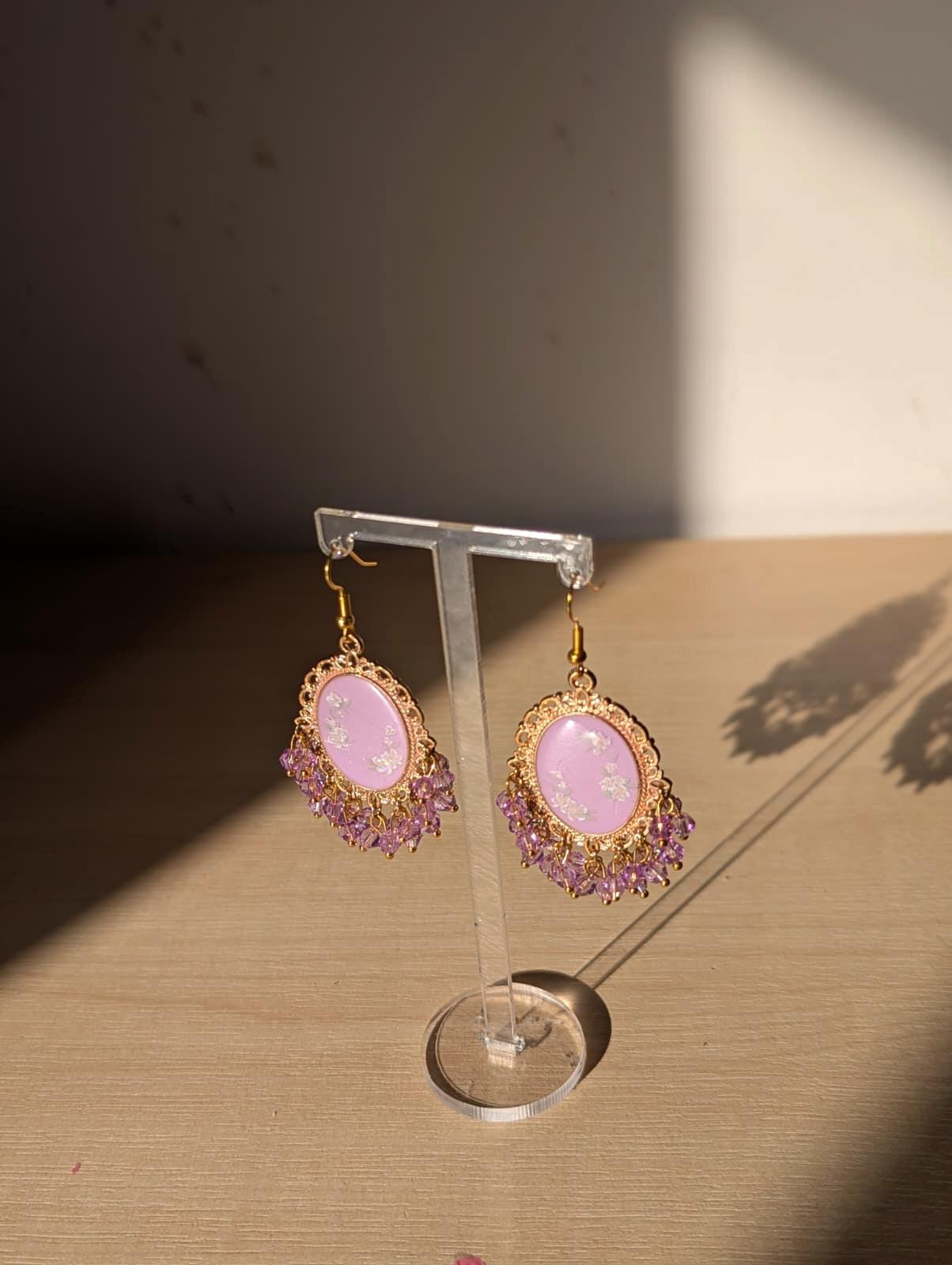 Purple floral resin earrings in gold