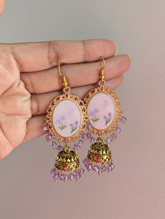 Purple on purple floral jhumkay drop earrings in gold
