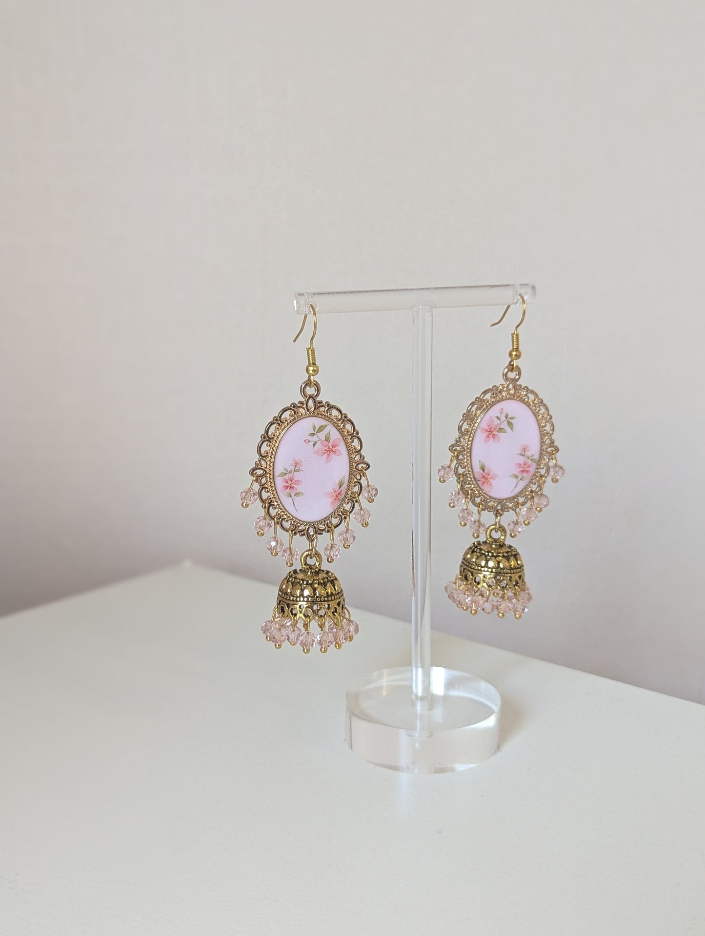 Pink floral jhumka drop earrings in gold