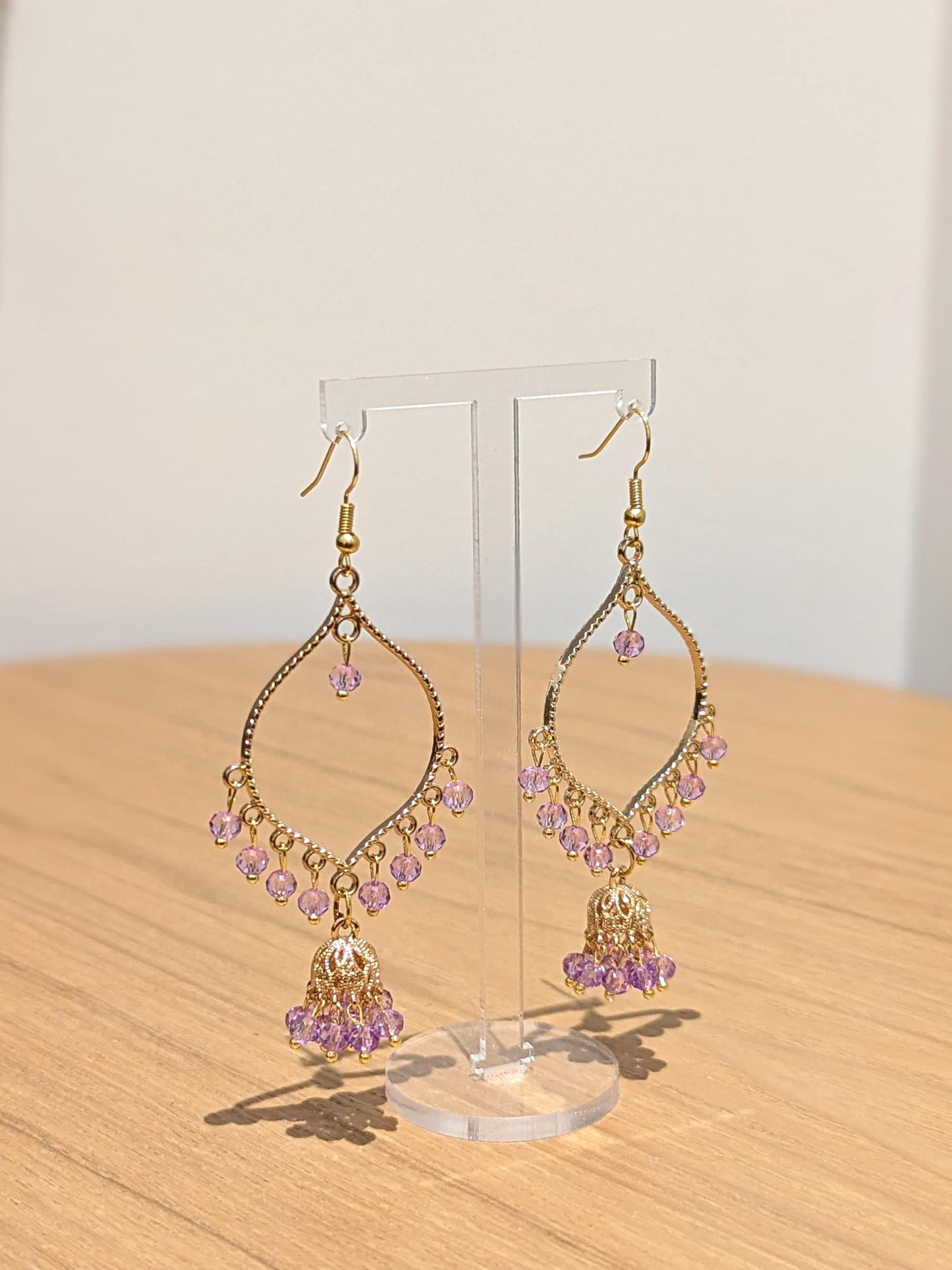 Jhumka drop earrings in gold and purple