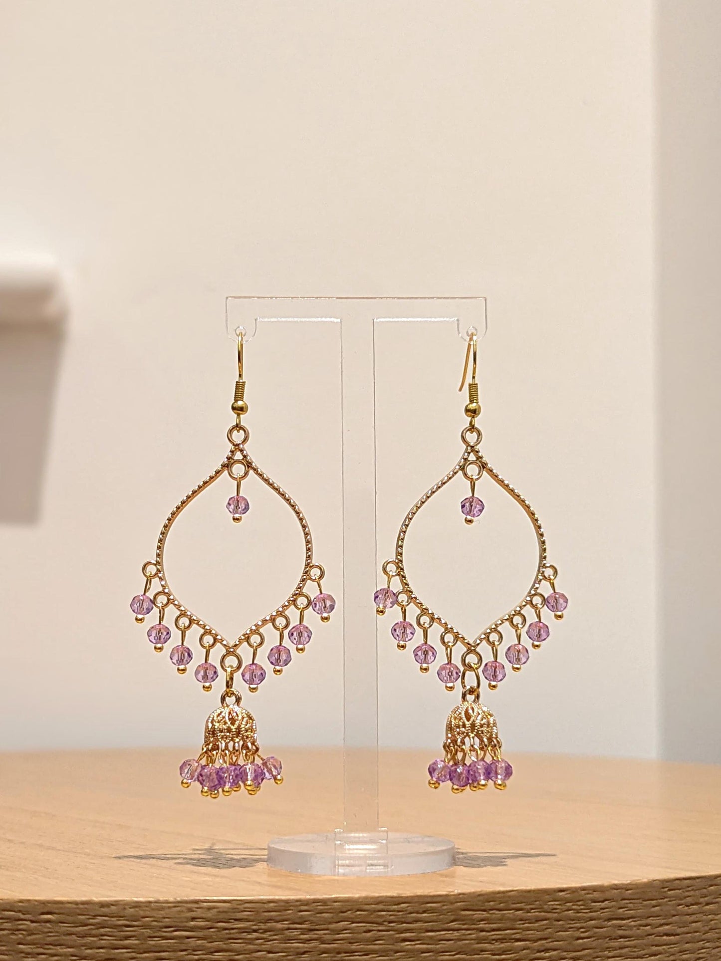 Jhumka drop earrings in gold and purple