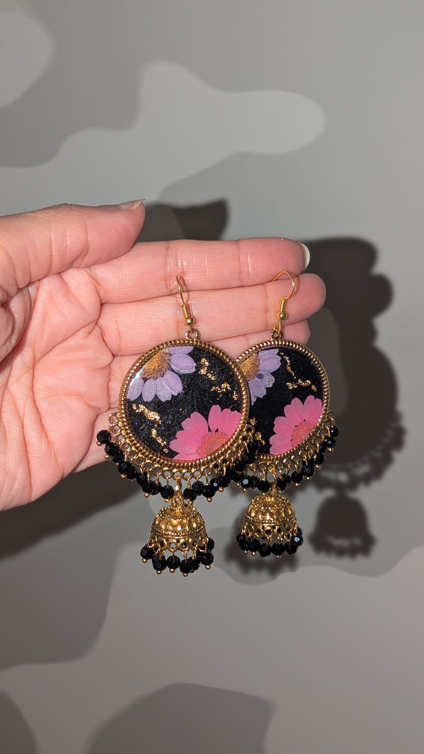 Dreamy Floral Black Jhumkas in Gold