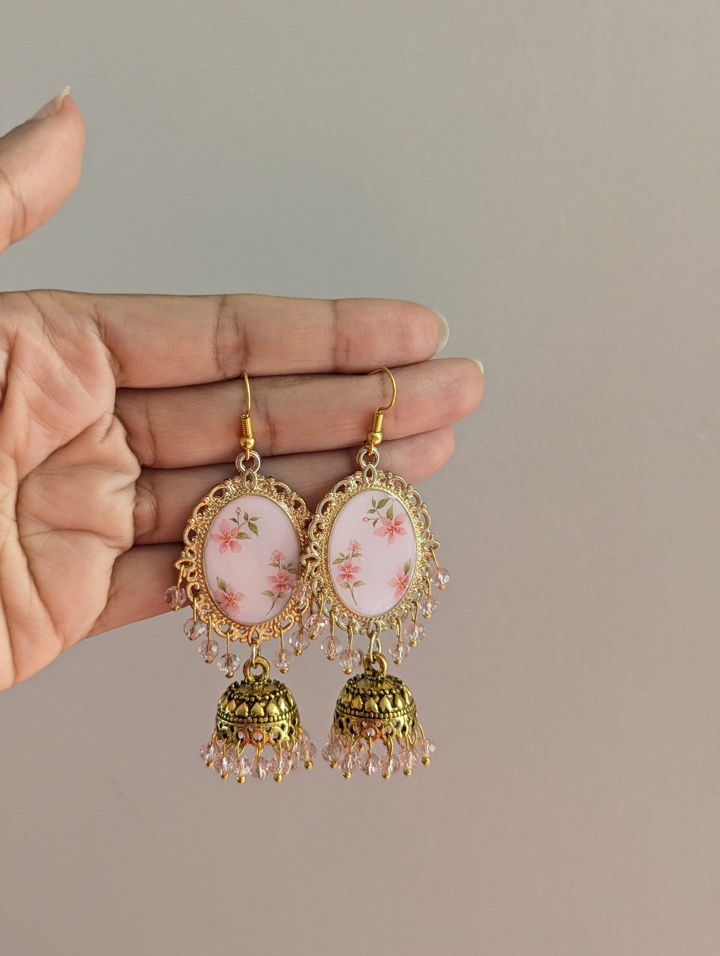 Pink floral jhumka drop earrings in gold