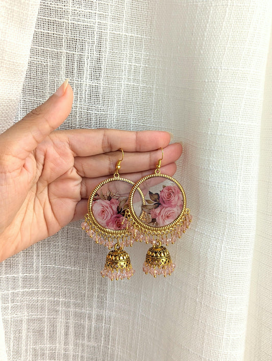 Pink flowers resin jhumka earrings