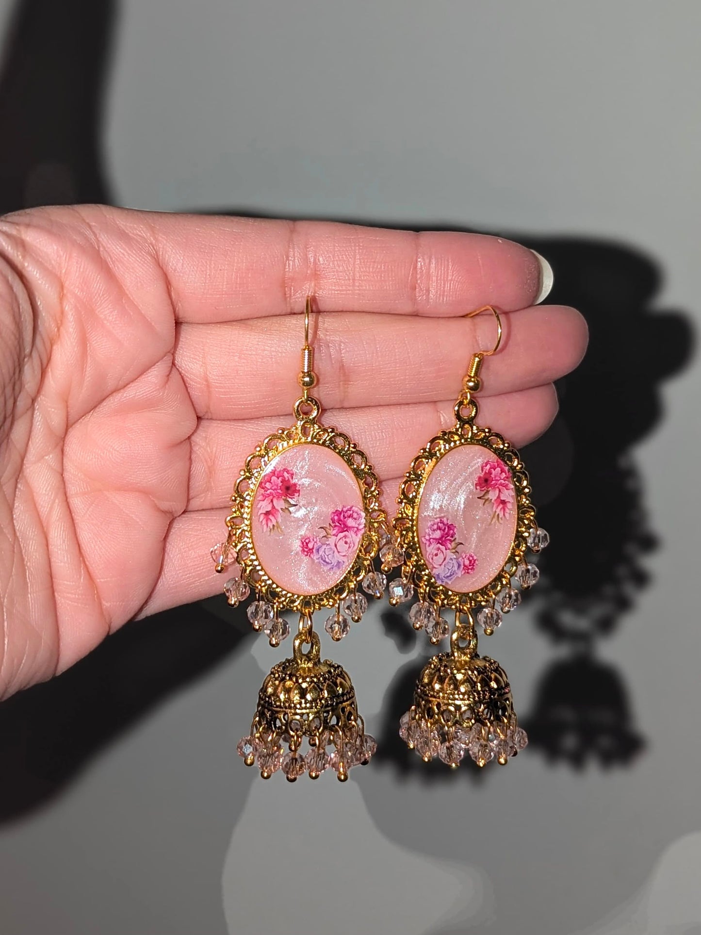 Multi Pink Shimmery Jhumkay in Gold
