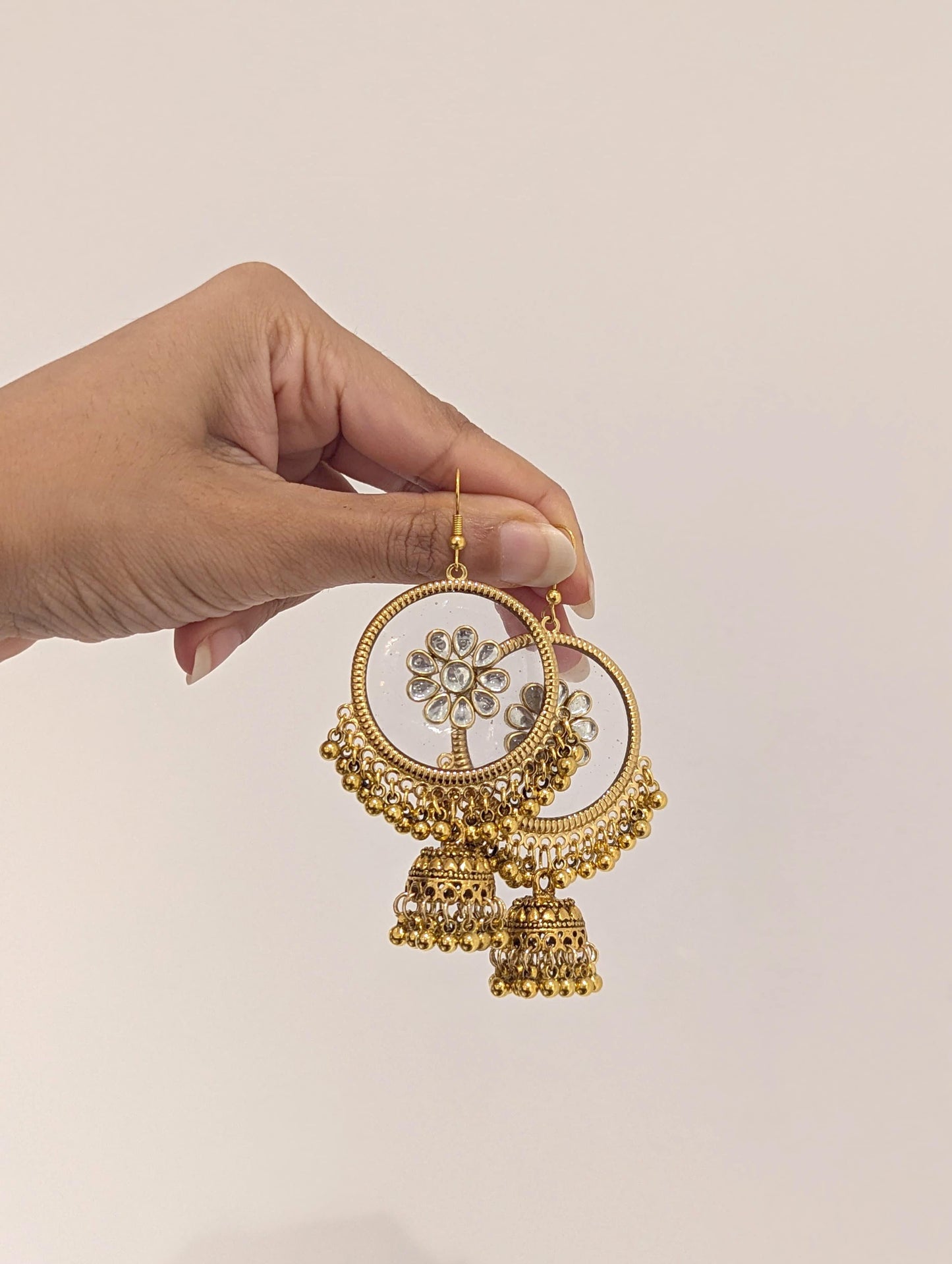 Kundan flower gold jhumka earrings